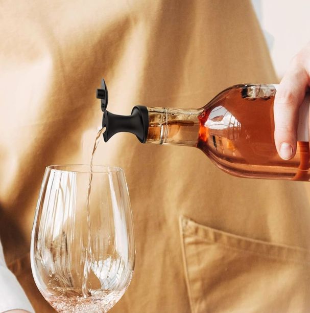 Pour and Seal pourers in use at a bar